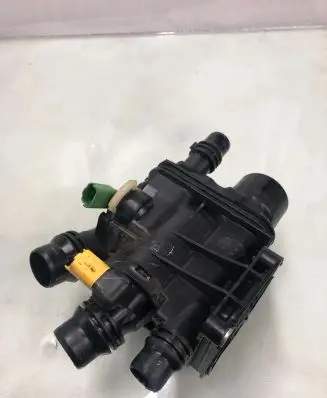 Thermostat/thermostat housing