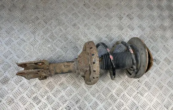 Subaru Legacy Front shock absorber with coil spring