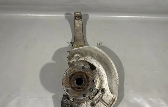 Volkswagen Touareg II Front wheel hub spindle knuckle 7P0407245A