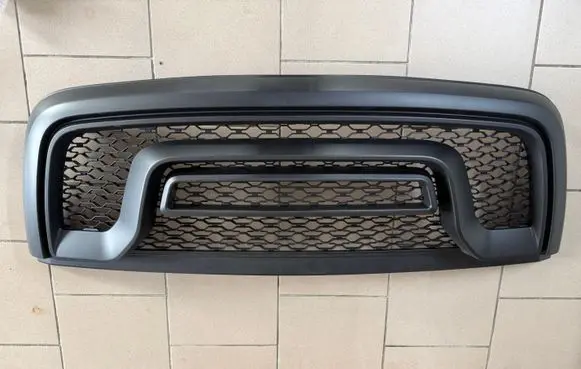 Dodge RAM 1500 DS Front bumper upper radiator grill 6NM18SZ0AA PDG07087A