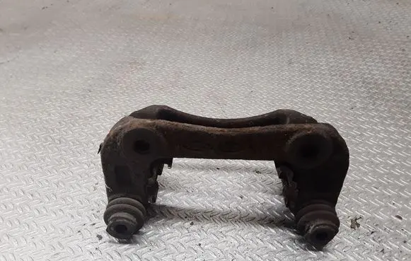 KIA Carens II Brake caliper pad carrier rear 