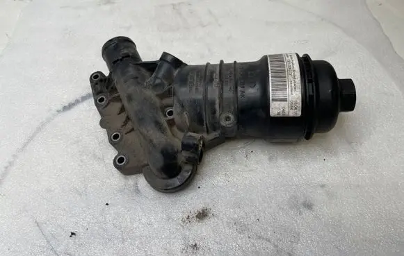 Volkswagen Touareg III Oil filter mounting bracket 059115389AK DEN006223 1120121504