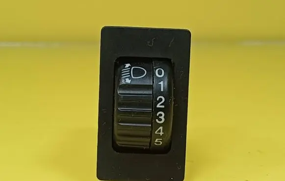 Headlight level height control switch