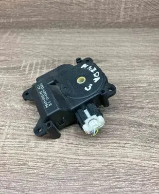 Mazda 3 I Air flap motor/actuator 8610000990