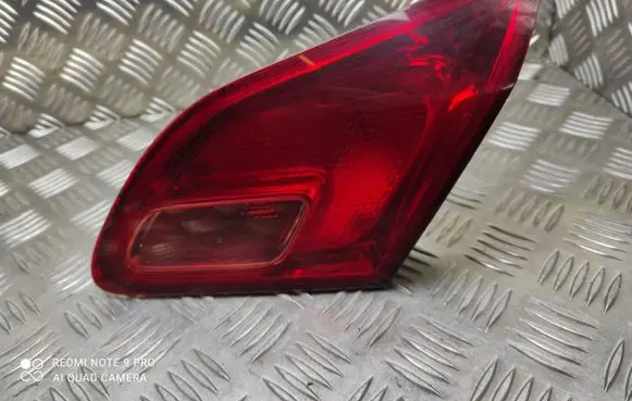 Opel Astra J Tailgate rear/tail lights 1090098 5027
