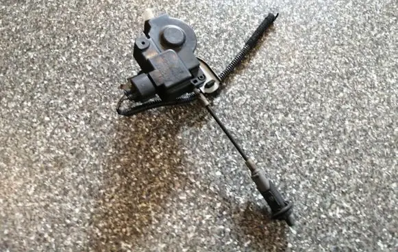 Fuel tank cap lock motor