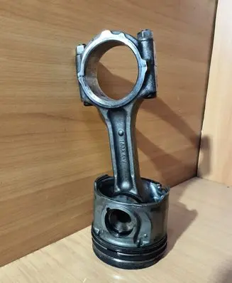 Piston with connecting rod