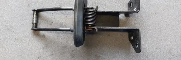 Rear door check strap stopper
