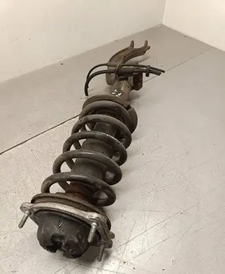 Front shock absorber with coil spring