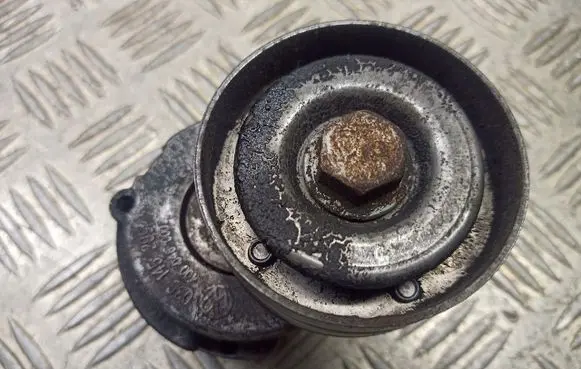 Volkswagen Touran I Alternator belt tensioner pulley 03C145299L