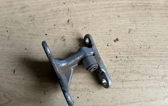 Mitsubishi Colt Rear door upper hinge