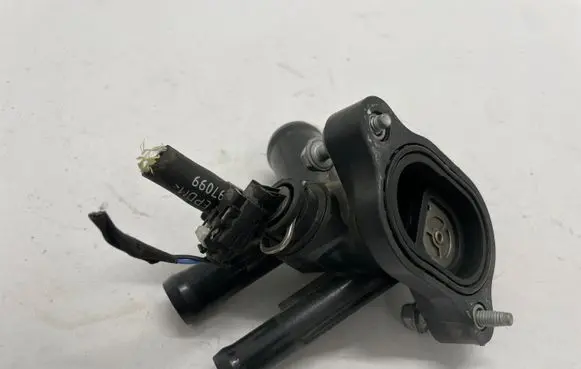 Thermostat/thermostat housing