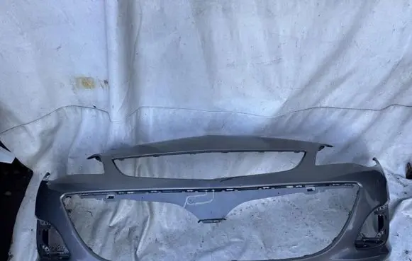 Opel Astra J Front bumper 13368660