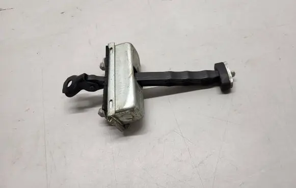 Front door check strap stopper