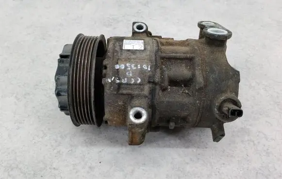 Opel Corsa D Air conditioning (A/C) compressor (pump) 557037215E5275400