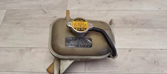 KIA Cerato Coolant expansion tank/reservoir 254292F410