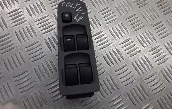 Mitsubishi Colt CZ3 Front door window switch trim MN587475