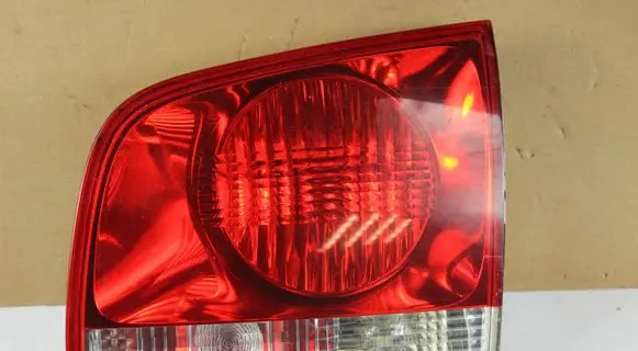 Volkswagen Touareg I Tailgate rear/tail lights 28268003