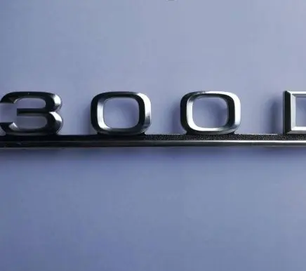 Mercedes-Benz W123 Manufacturers badge/model letters 1238170915