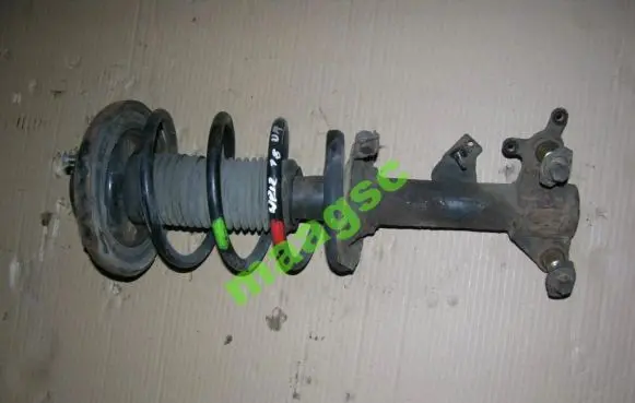 Nissan Primera Front shock absorber with coil spring