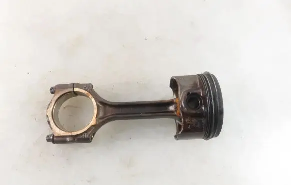 Piston with connecting rod