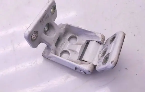 Rear door upper hinge