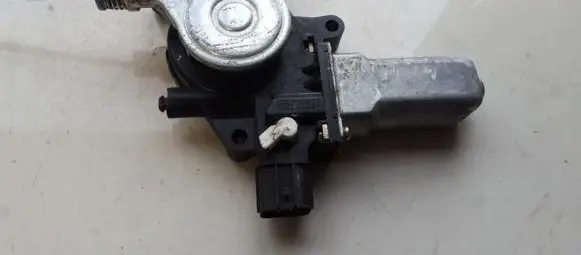 Mazda 323 Front door window regulator motor