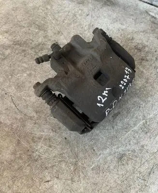 Nissan Juke I F15 Front brake caliper