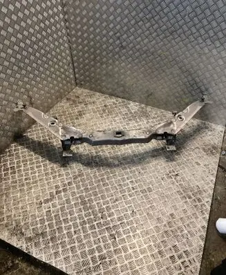 Top upper radiator support slam panel