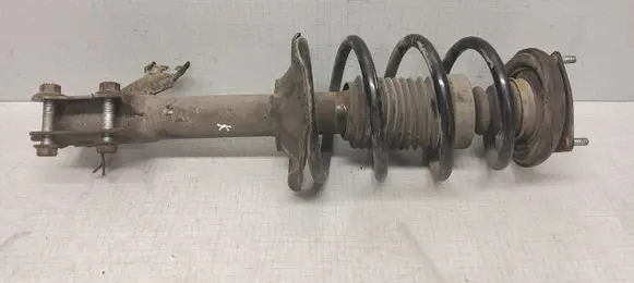Nissan Almera N16 Front shock absorber with coil spring