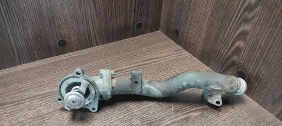 Thermostat/thermostat housing