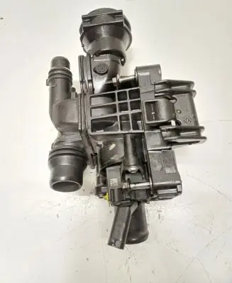 Thermostat/thermostat housing