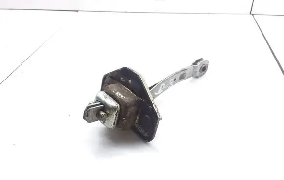 Subaru Legacy Rear door check strap stopper