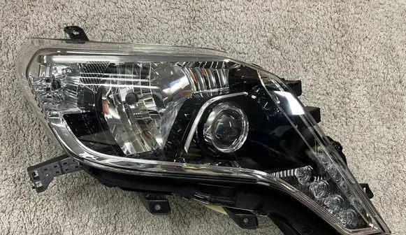 Toyota Land Cruiser (J150) Headlight/headlamp 8114560J20