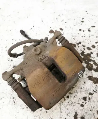 Volkswagen Golf VII Front brake caliper