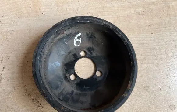 Opel Astra H Water pump pulley 24405900