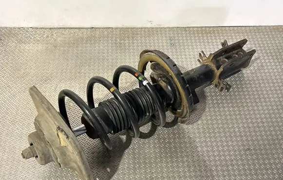 Front shock absorber with coil spring