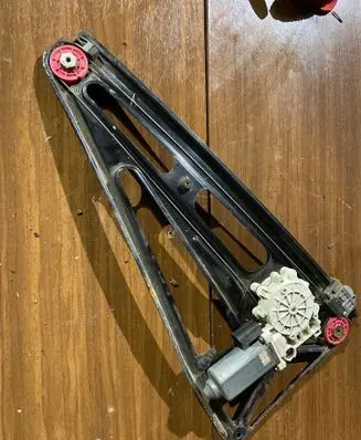 Rear door window regulator with motor