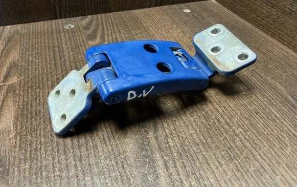 Rear door upper hinge