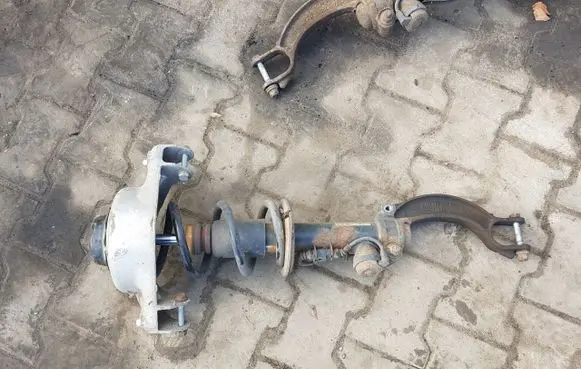Front shock absorber with coil spring