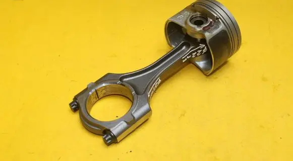 Piston with connecting rod