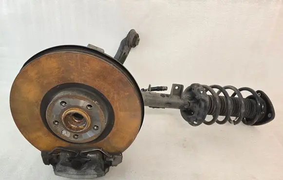 Front wheel hub spindle knuckle