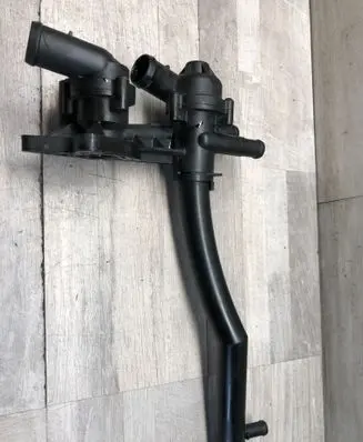 Thermostat/thermostat housing