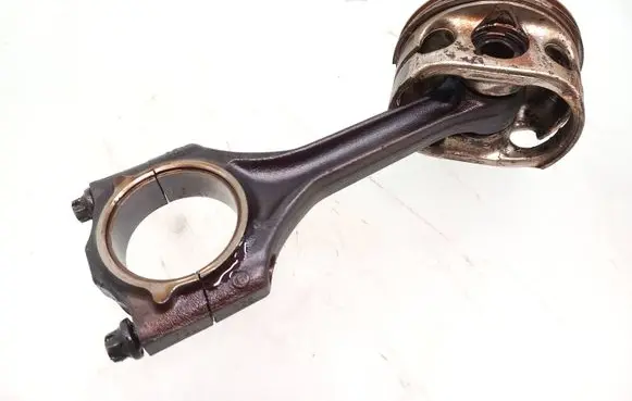 Piston with connecting rod