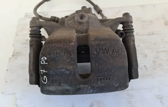 Volkswagen Golf VII Front brake caliper
