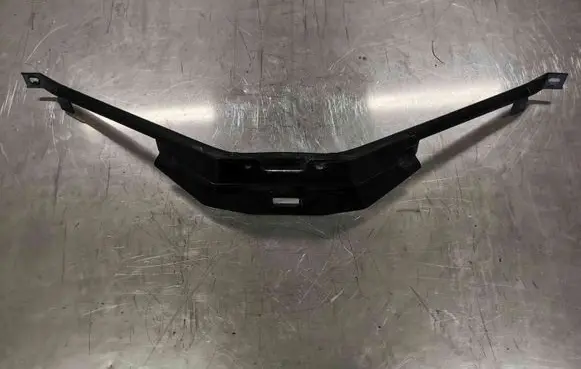 Engine bonnet/hood lock trim molding