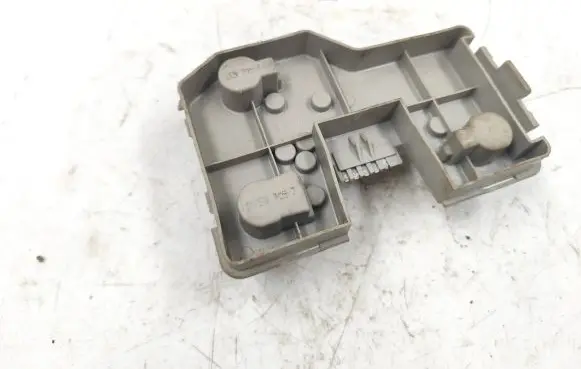 Tail light bulb cover holder