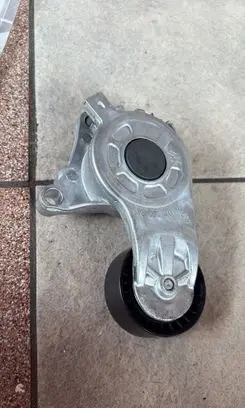 Peugeot Partner Generator/alternator belt tensioner 1611503780