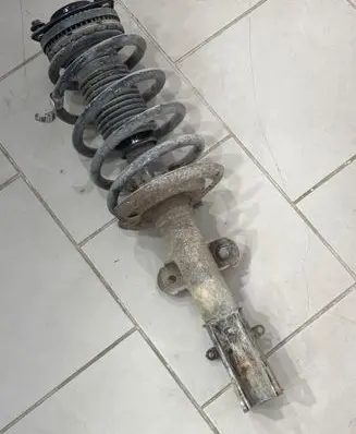 Chrysler Grand Voyager V Front shock absorber with coil spring 04743989AC