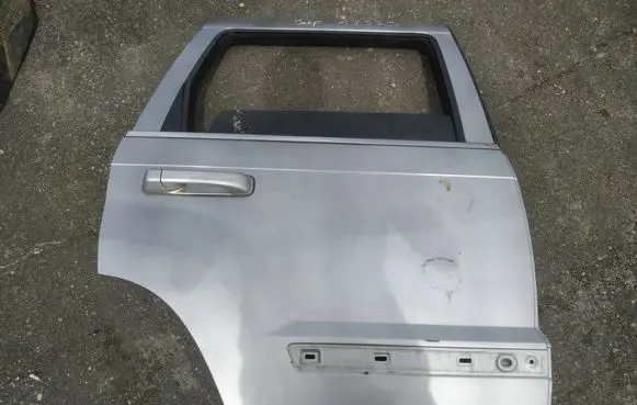 Jeep Grand Cherokee (WK) Rear door pilkos